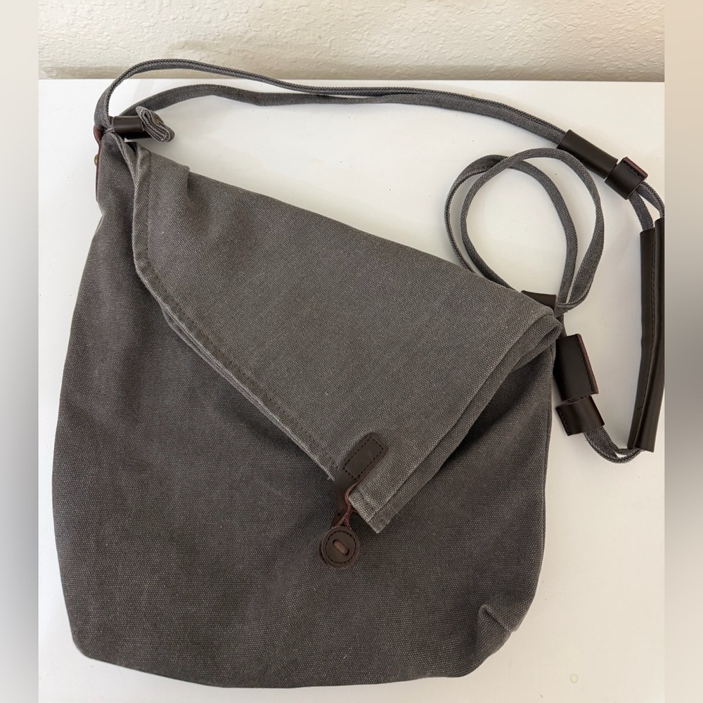 Coofit unisex gray canvas messenger crossbody bag leather trim button closure.